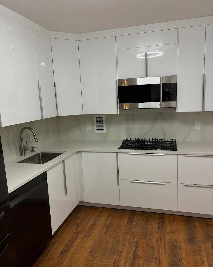 Restored kitchen with white cabinets after water damage in Paterson